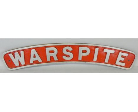 A reproduction brass and red enamel nameplate 'Warspite', 70 x 10 cm.
