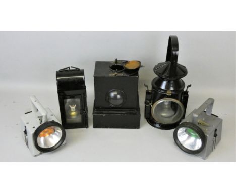 A WWII military Wakefields Birmingham signal lamp 1945, together with a British Rail (M) lamp, a British Rail (E) Sherwoods L