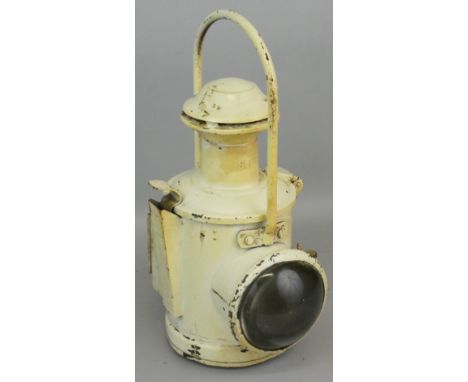 A British Rail locomotive Headlamp, complete with reservoir and burner, height 37cm.