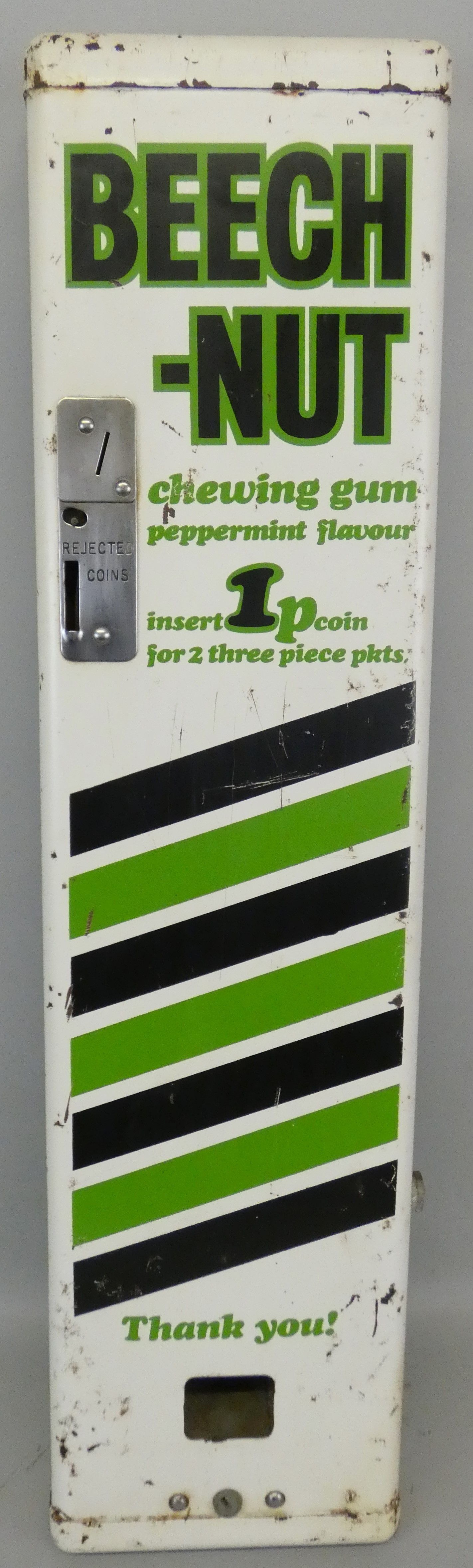 A rectangular 'Beechnut' vending machine, in white with green and