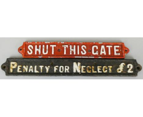 A painted cast iron sign 'SHUT THIS GATE', length 42.5cm, together with a cast iron 'Penalty for Neglect £2' sign, length 52c