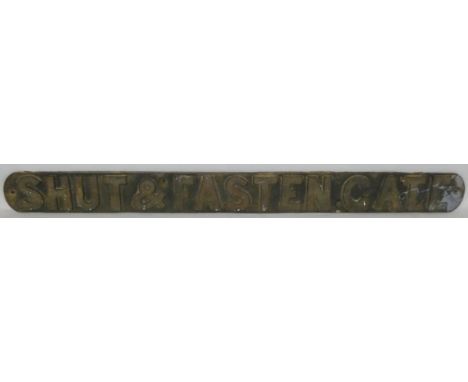 A cast iron sign 'SHUT &amp; FASTEN GATE', 8 x 84cm.