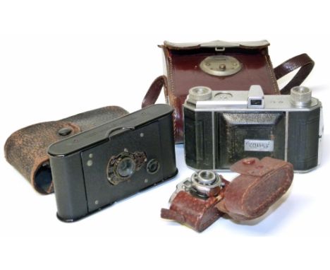 Two Kodak cameras and a miniature camera Condition reports are not available for our Interiors Sales.
