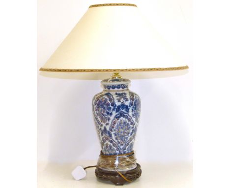 Blue/white/gilt table lamp complete with shade. Condition reports are not available for our Interiors Sales.