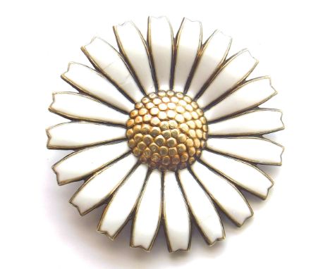 Silver and enamel daisy brooch, stamped "Sterling Denmark" by Anton Michelsen. Condition reports are not available for our In