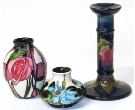 Moorcroft birds and fruit candlestick and two vases Condition reports are not available for our Interiors Sales.