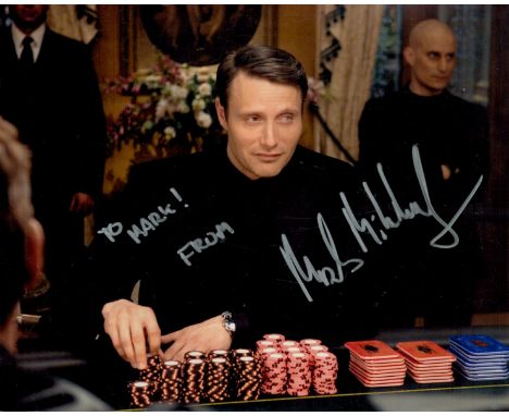 Mads Mikkelsen signed 10x8 inch Casino Royale colour photo dedicated. Good Condition. All autographs come with a Certificate 