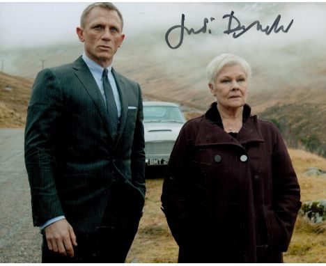Judi Dench as M in Skyfall signed super 10 x 8 inch colour photo with James Bond Daniel Craig. English actress and was notabl