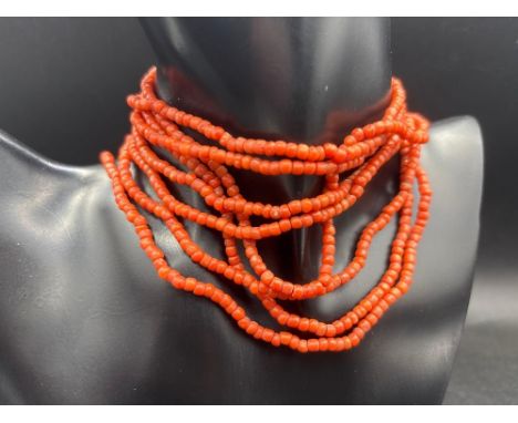 A unusual long string of coral beads 90 inch