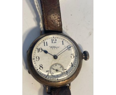 A vintage silver wrist watch by WALTHAM with seconds dial