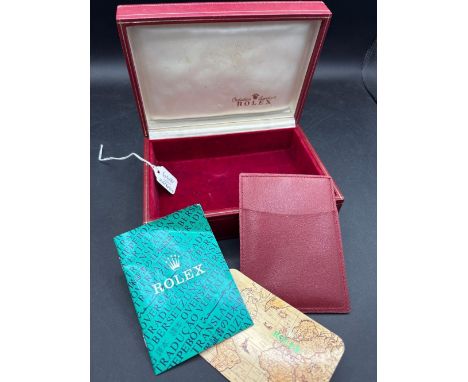 A red ROLEX wrist watch box