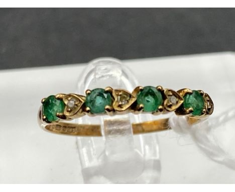 A emerald and diamond ring 9ct size L