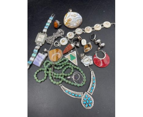A bag of brooches and beads etc.