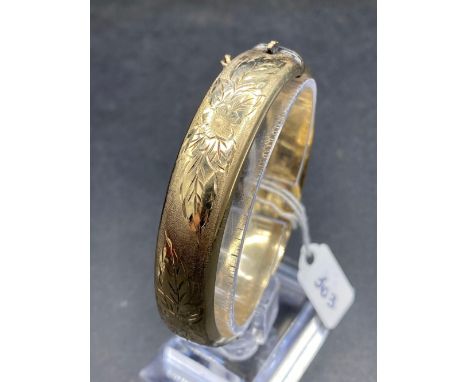 A silver gilt hinged bangle 25 gms