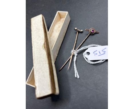 Two gold stick pins 2.1 gms