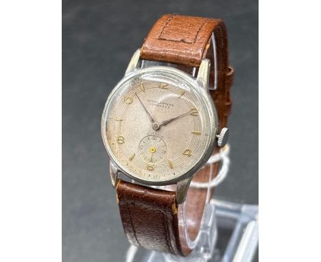 A vintage gents wrist watch by WINEGARTEN with seconds dial