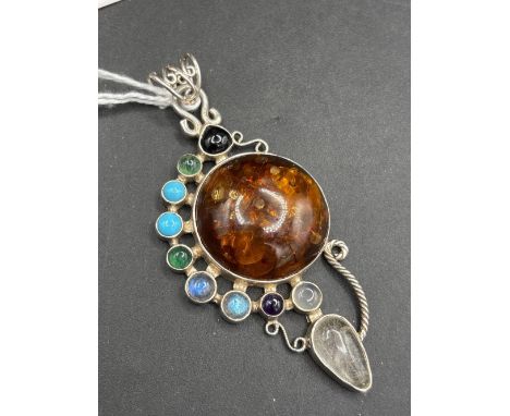 A amber moonstone and stone set pendant 85mm