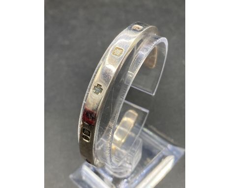 A silver hallmarked bangle 29 gms