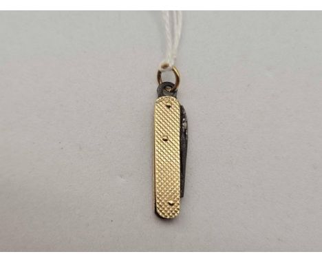 A miniature 9ct mounted pen knife charm
