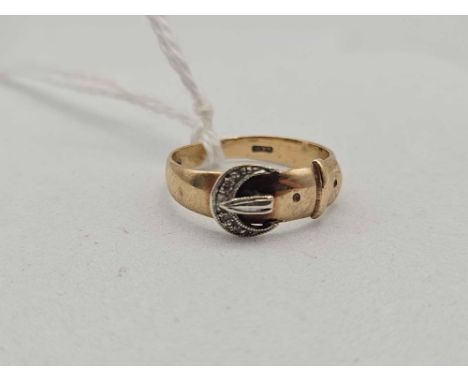 A diamond buckle ring 9ct size K 2.4 gms