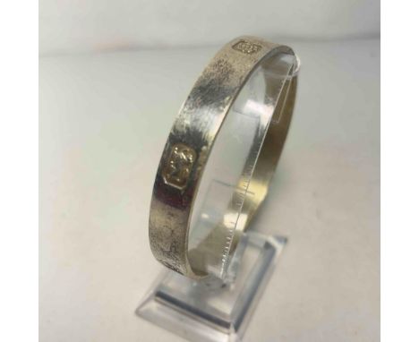 A silver hallmarked bangle 44 gms