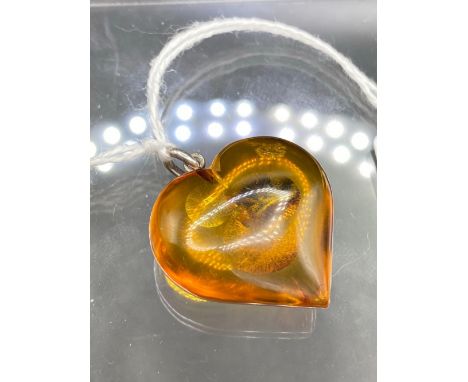 A amber heart pendant