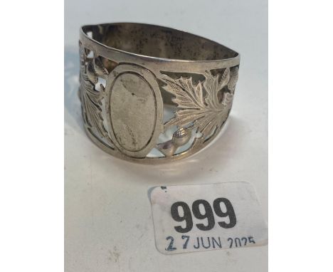 A D shaped napkin ring decorated with thistles Birmingham 1906 by GH 31g