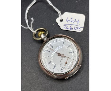 A large silver gilt pocket watch with seconds dial