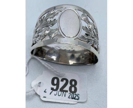 A D-shaped napkin ring embossed with thistles and foliage Birmingham 1909 by GH