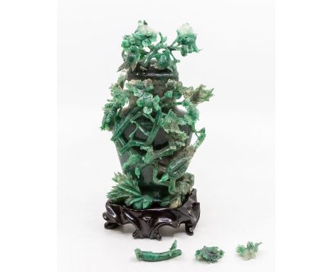 A Modern Chinese spinach green jade carved vase and cover, with carved stand, boxed - a/f broken pieces from cover and body, 