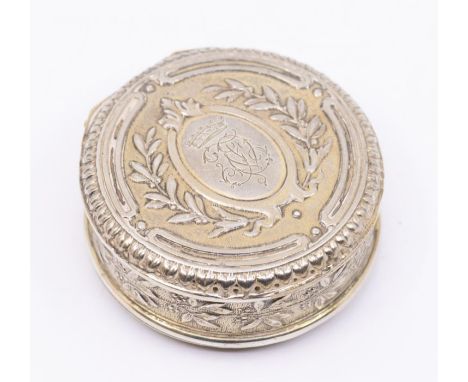 A Continental probably French silver gilt circular snuff box and cover, the central cartouche chased with an Earl's coronet a