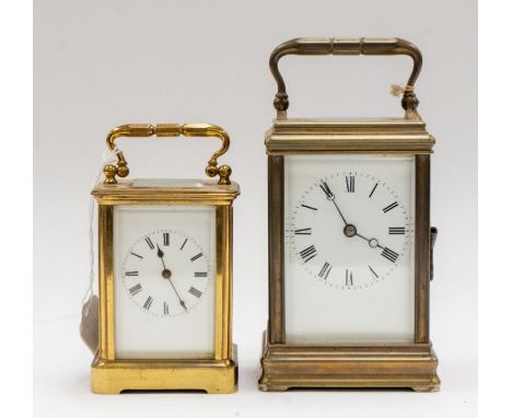 An early 20th century French brass carriage clock, together with a mid 20th century brass carriage clock, both with Roman num