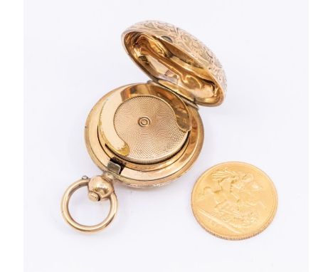 An Elizabeth II full sovereign coin, dated 1963, within a gold plated sovereign case with engraved scroll decation and vacant