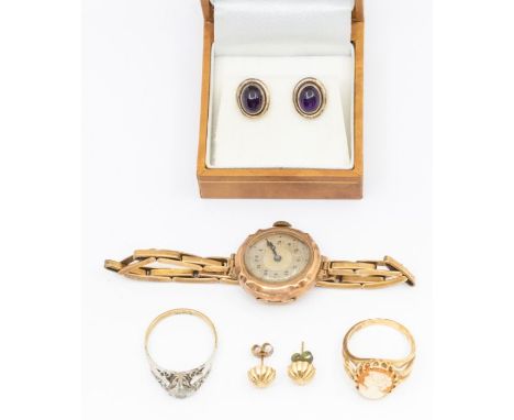 A collection of gold jewellery to include a 9ct gold ladies wristwatch with 9ct gold expander strap a/f, a white stone platin