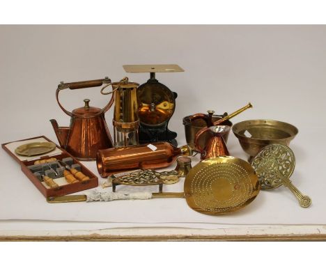 A collection of 19/20th Century brass and copper wares, including a jam pan, bed pan, large post office scales, Victorian tri