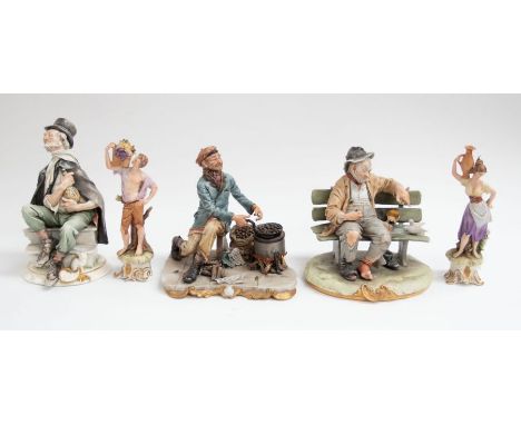 Capo di monte - Five figurines depicting a man on a bench, a man cooking on stove, a gentleman and a cat, and two figures of 