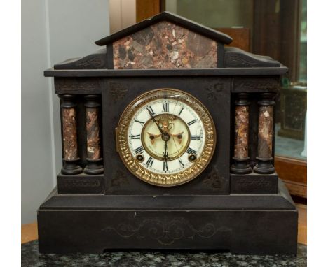 A late 19th century French slate mantel clock. A.F.