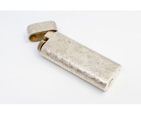 Cartier: a vintage silver cased pocket lighter, textured matte finish, length approx 70mm, marked to  base Cartier Paris 1067