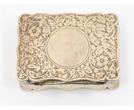A late Victorian cartouche shaped snuff box, engraved decoration, vacant cartouche, gilt interior,&nbsp; hallmarked by Colen 