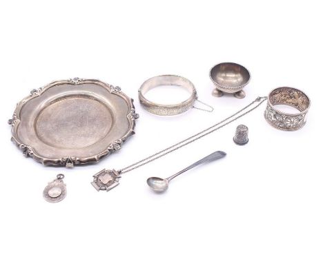 A collection of 925 silver to include: small dish, bangle, napkin ring, thimble, condiment spoon, medal, various dates and ma