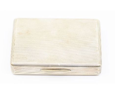 An Elizabeth II silver engine turned snuff box, gilt interior and thumbpiece, hallmarked by W H Manton Ltd, Birmingham, 1962,