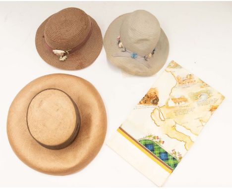 Two late 1920s straw hats, one in pale grey (discoloured round the brim) with a flower detail round the crown and one coffee-