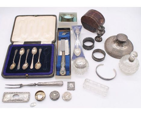 A collection of silver to include; a small Birmingham hallmarked ink well (no liner), a Chester hammered silver topped trinke