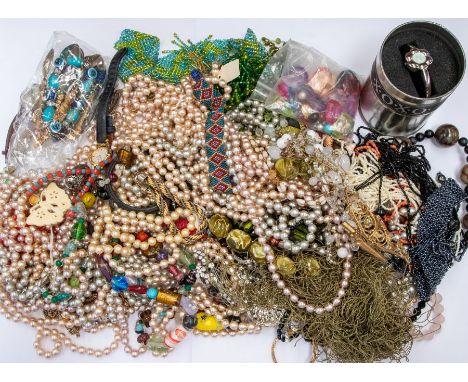 A collection of costume jewellery to include faux pearls, glass and plastic bead necklaces, paste set jewellery, rose quartz 