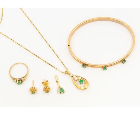 A collection of emerald set jewellery comprising a 14ct gold pendant and chain,  a 14c gold emerald and diamond small pendant