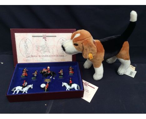 A soft toy Steiff beagle with tags and button, together with a boxed set of Britain's The Royal Scots Dragon Guards