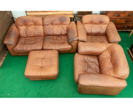 De Sede - A 1969 DS101 dark tan leather matching sofa, two chairs and one foot stool.Sofa approx. 182cm wide x 90cm deep x 74