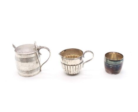 A collection of silver to include; A Victorian silver drum mustard pot, with ribbed body and gilt interior, hallmarked London
