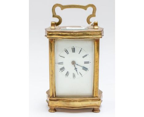 An early 20th century French brass carriage clock with Roman numerals, in working order.