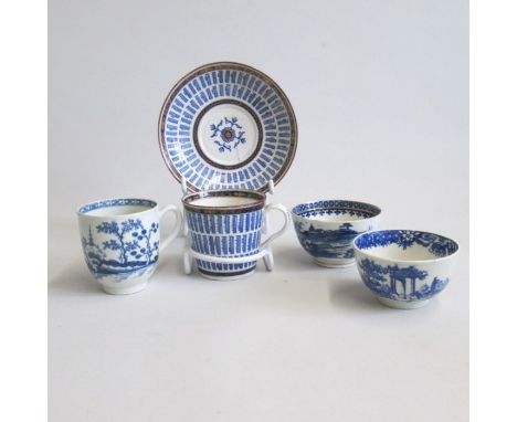 A Flight Barr and Barr Worcester ‘Music staff’ pattern cup and saucer with gilt and blue chevron and trellis band to rims and